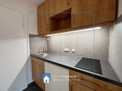 Modern sanierte 1-Zimmer-Wohnung nahe Universität mit Terrasse und Tiefgaragenstellplatz